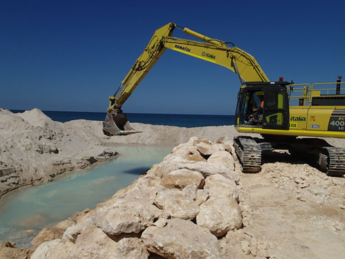 Quinns image - excavator on beach