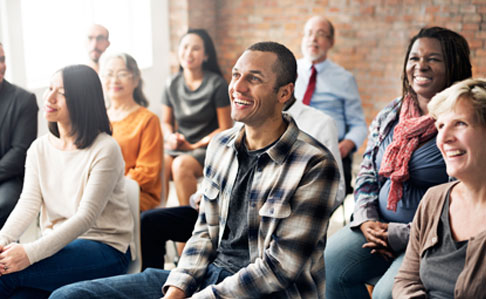 Group of people in community meeting