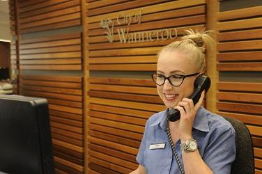 Image of front counter staff member