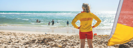 Surf lifesaver on beach