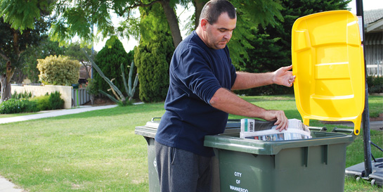 Man recycling rubbish