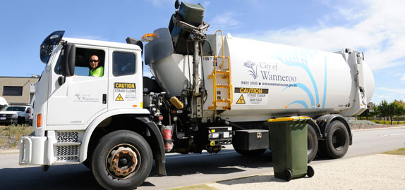 Waste truck collecting rubbish