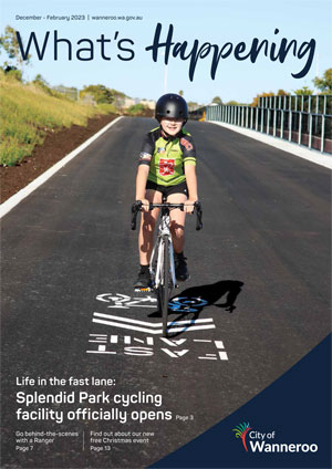 Child riding bike on track