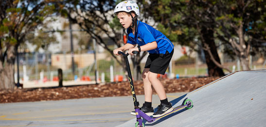 Child on scooter